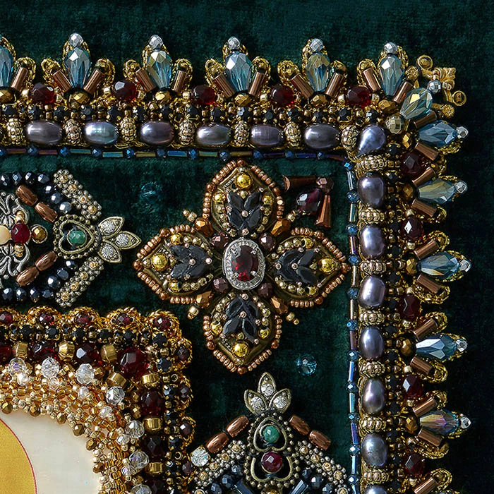 The embroidered icon "The Righteous Warrior Feodor Ushakov" in a frame and a case