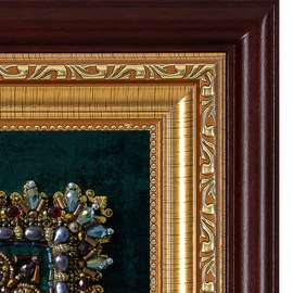 The embroidered icon "The Righteous Warrior Feodor Ushakov" in a frame and a case