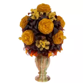 An amber ikebana in an onyx vase