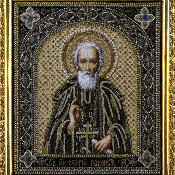 Embroidered icon of St. Sergius of Radonezh in a frame and a kiosk