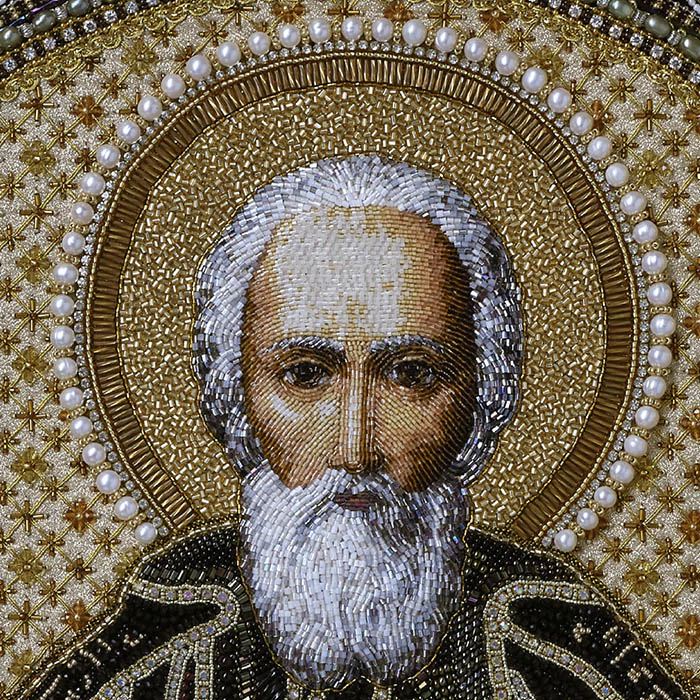 Embroidered icon of St. Sergius of Radonezh in a frame and a kiosk