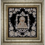 The embroidered icon of St. Nicholas the Wonderworker in a frame