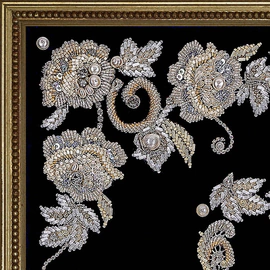 The embroidered icon of St. Nicholas the Wonderworker in a frame