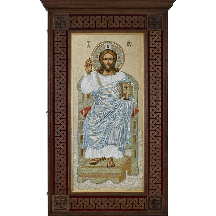 The embroidered icon "The Lord Almighty on the throne" in a frame and a kiosk