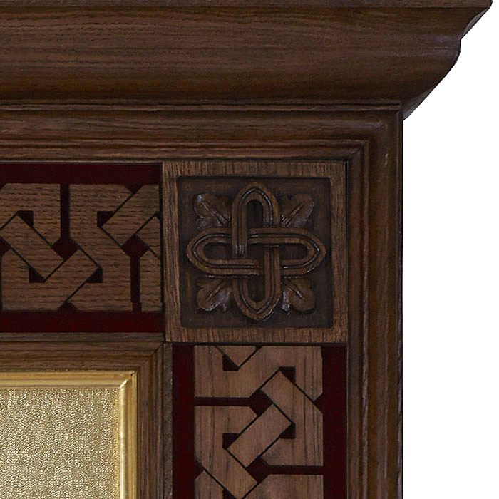 The embroidered icon "The Lord Almighty on the throne" in a frame and a kiosk