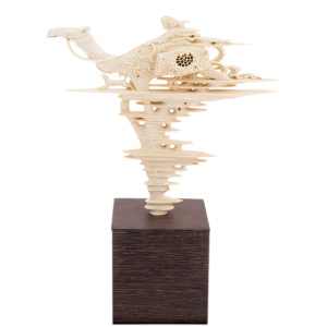 Highly artistic sculpture of a mammoth tusk "Traveller"