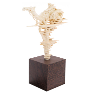 Highly artistic sculpture of a mammoth tusk "Traveller"