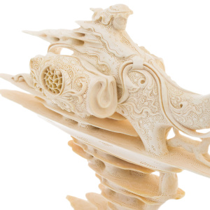 Highly artistic sculpture of a mammoth tusk "Traveller"