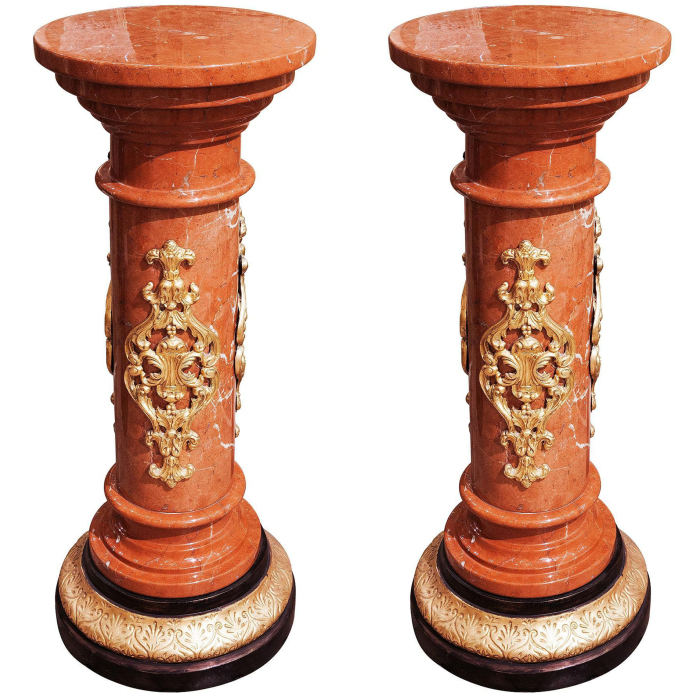 A pair of Corinth marble pedestals