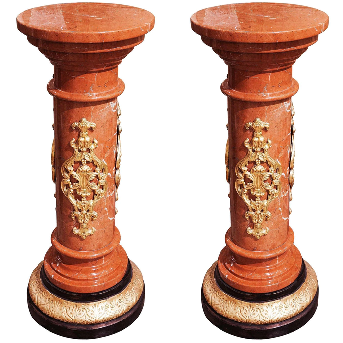 A pair of Corinth marble pedestals