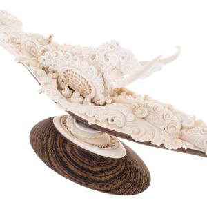 Highly artistic sculpture of a mammoth tusk "Mammoth. The path"
