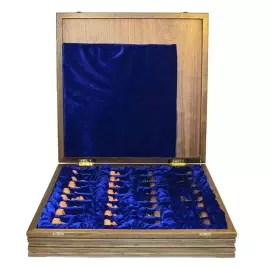 Wooden carved chess set "Peoples of the North" on an oak board