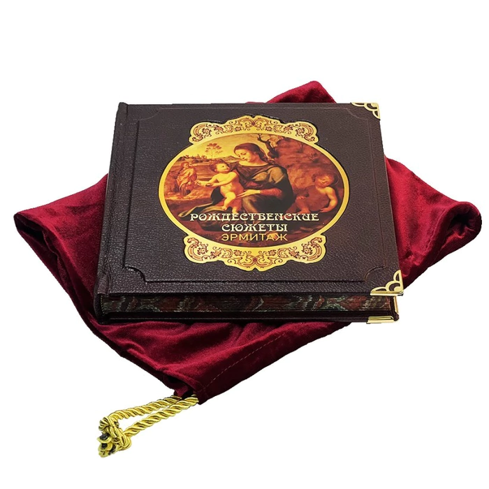 The leather-bound book "The Book of Power. Plato, Aristotle" in a case