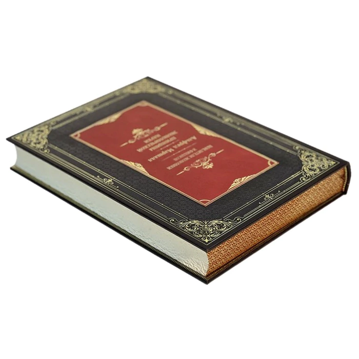 The leather-bound book "The Masters of Economics and Finance. Alfred Marshall, in a case