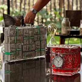 Epoxy resin art object "Suitcase of dollars"