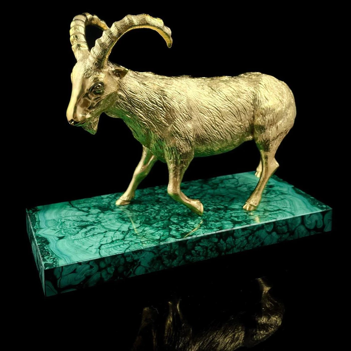 Gilded Golden Capricorn statuette on a malachite stand