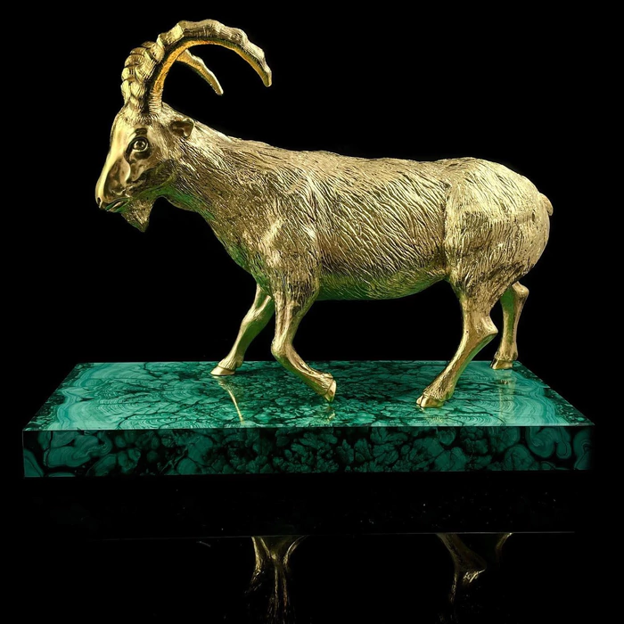 Gilded Golden Capricorn statuette on a malachite stand