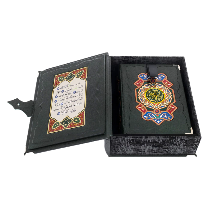 The leather-bound book "The Koran". Translation from Arabic and commentary by M. N. O. Osmanov (in the box)