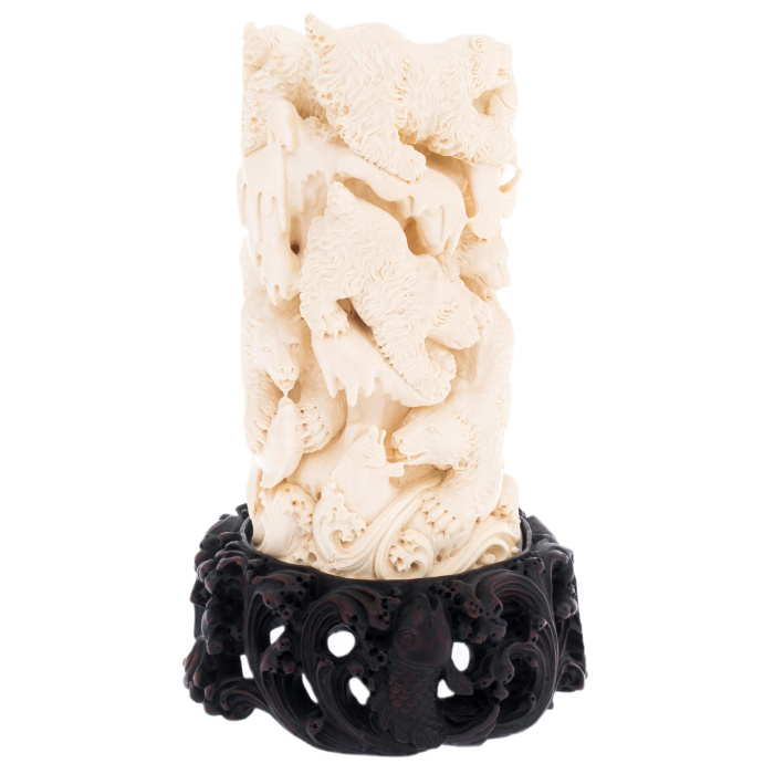 Mammoth tusk sculpture "Bears" on a stand