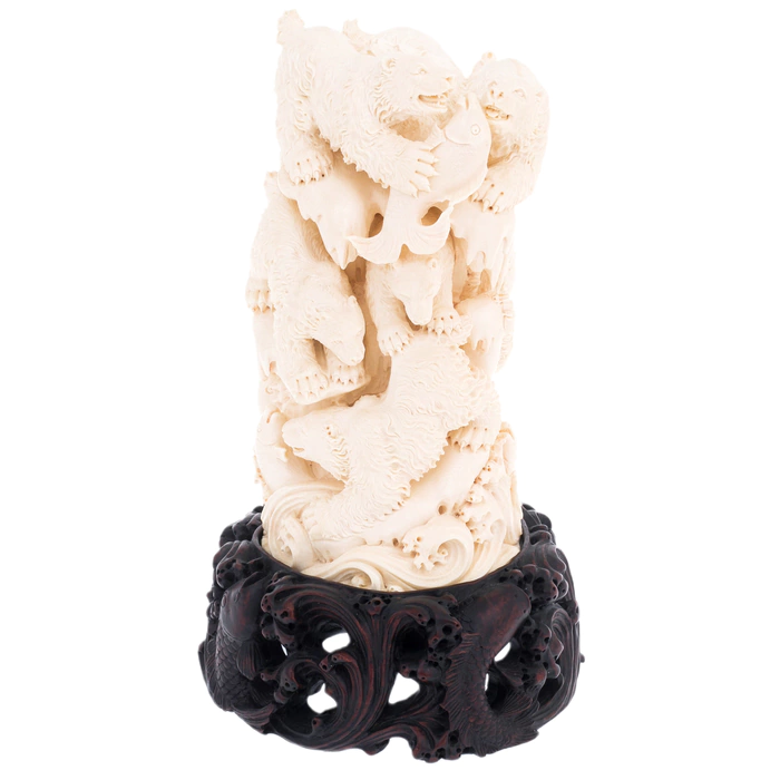 Mammoth tusk sculpture "Bears" on a stand