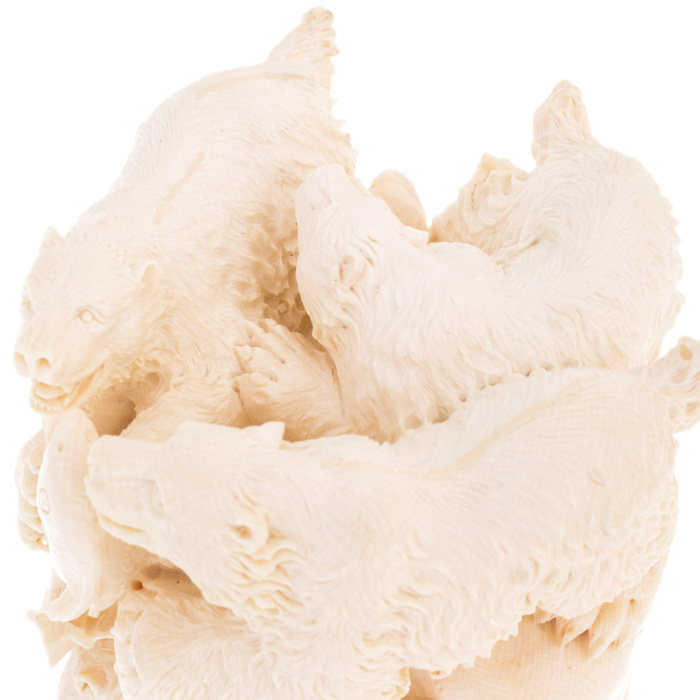 Mammoth tusk sculpture "Bears" on a stand