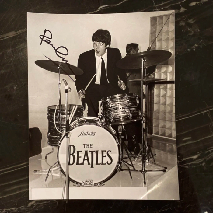 Autographed photo of musician Paul McCartney