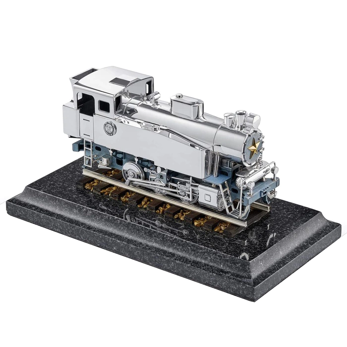 Silver sculpture "Steam Train" on marble