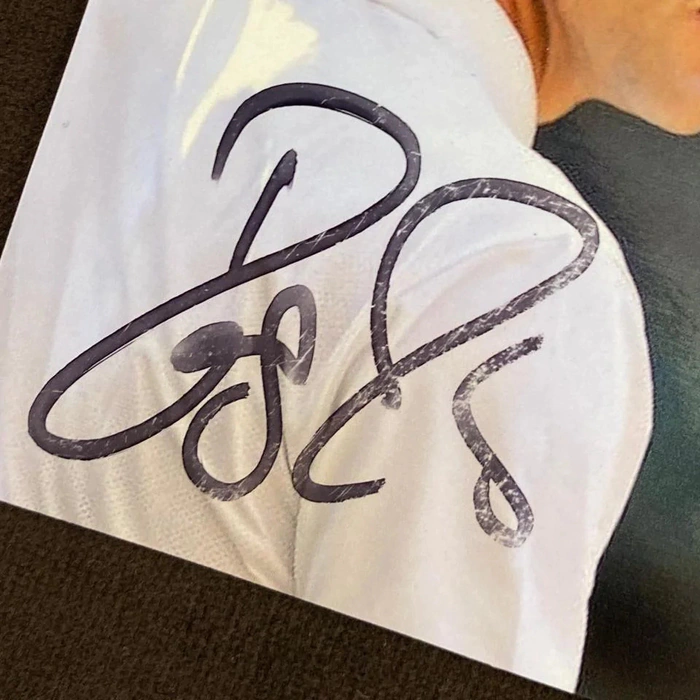Autographed photo of tennis player Roger Federer