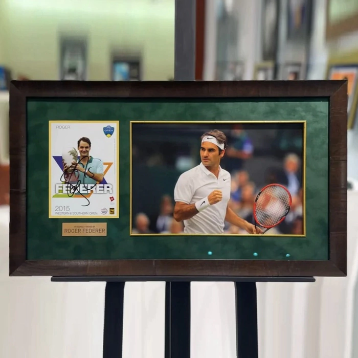 Autographed photo of tennis player Roger Federer