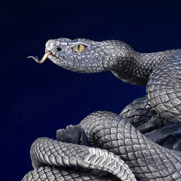 Silver statuette "Snake" on an onyx stand