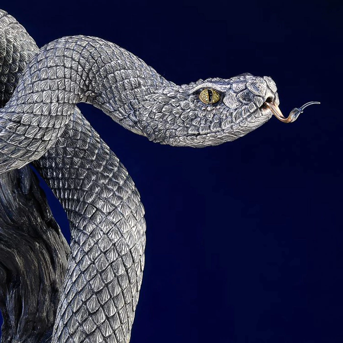 Silver statuette "Snake" on an onyx stand