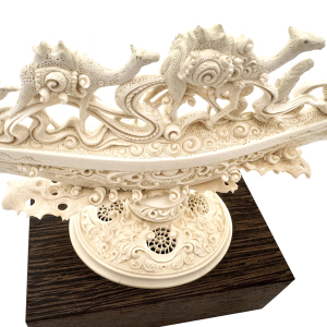 Highly artistic sculpture "The Great Silk Road" from a mammoth tusk