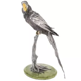 Silver sculpture "Parrot" on a marble stand