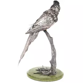 Silver sculpture "Parrot" on a marble stand