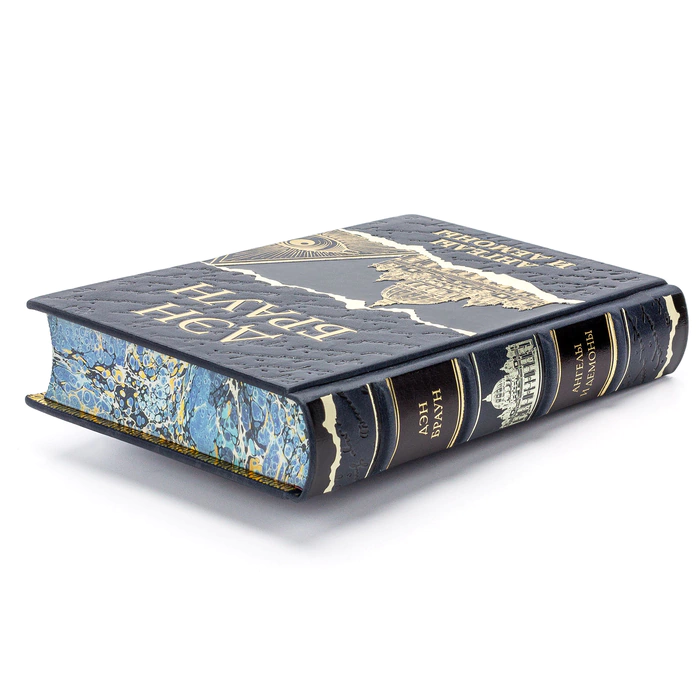 A leather-bound book by Dan Brown. Angels and Demons"