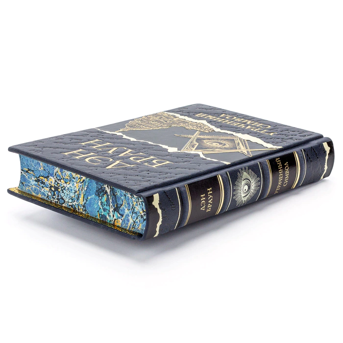 A leather-bound book by Dan Brown. The lost Symbol"