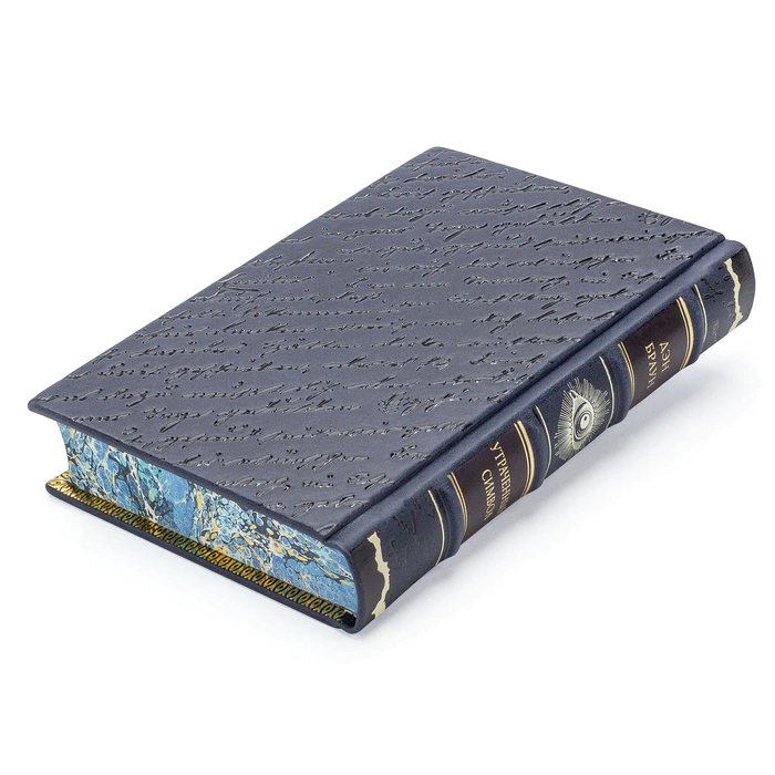 A leather-bound book by Dan Brown. The lost Symbol"