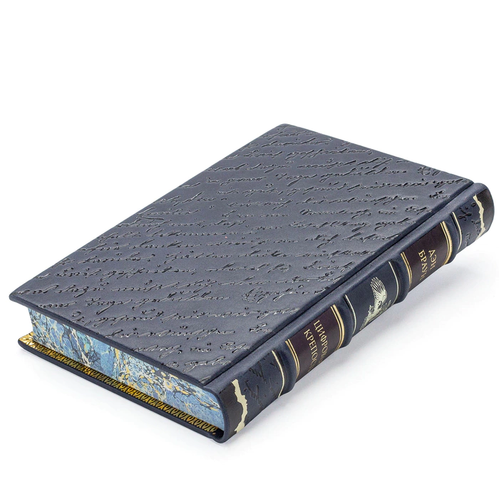 A leather-bound book by Dan Brown. Digital Fortress"