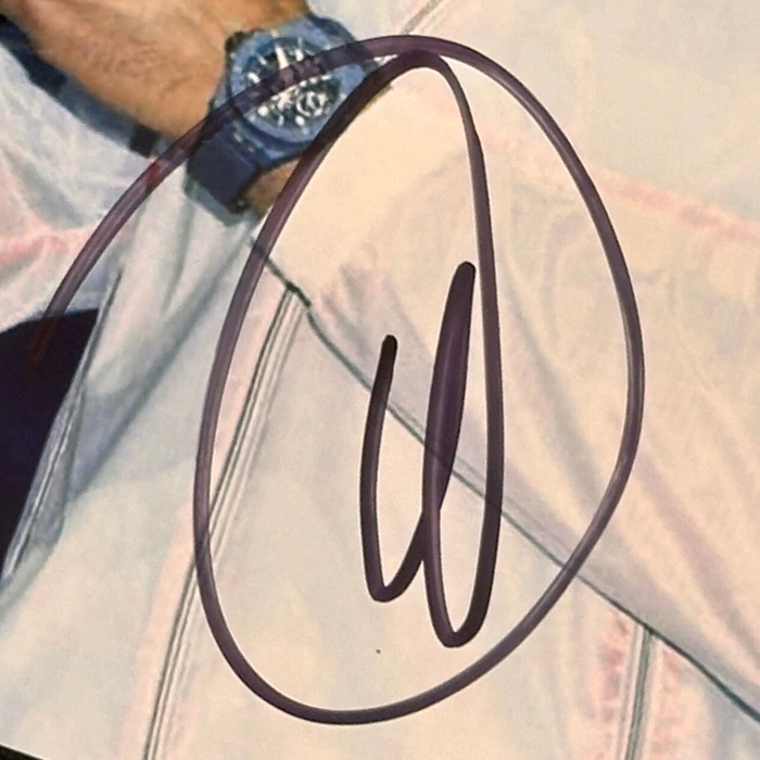 Autographed photo of tennis player Novak Djokovic