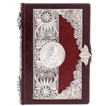 The leather-bound book "The Wisdom of a Leader"