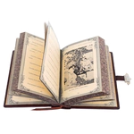 The leather-bound book "The Wisdom of a Leader"