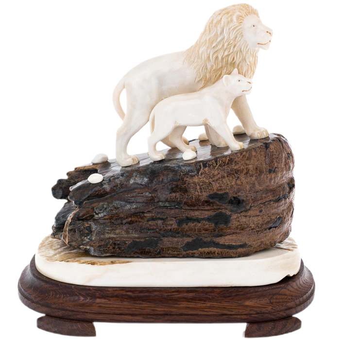 Sculpture of mammoth tooth, moose horn and mahogany "Lion and lioness on a rock"