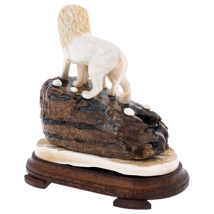 Sculpture of mammoth tooth, moose horn and mahogany "Lion and lioness on a rock"