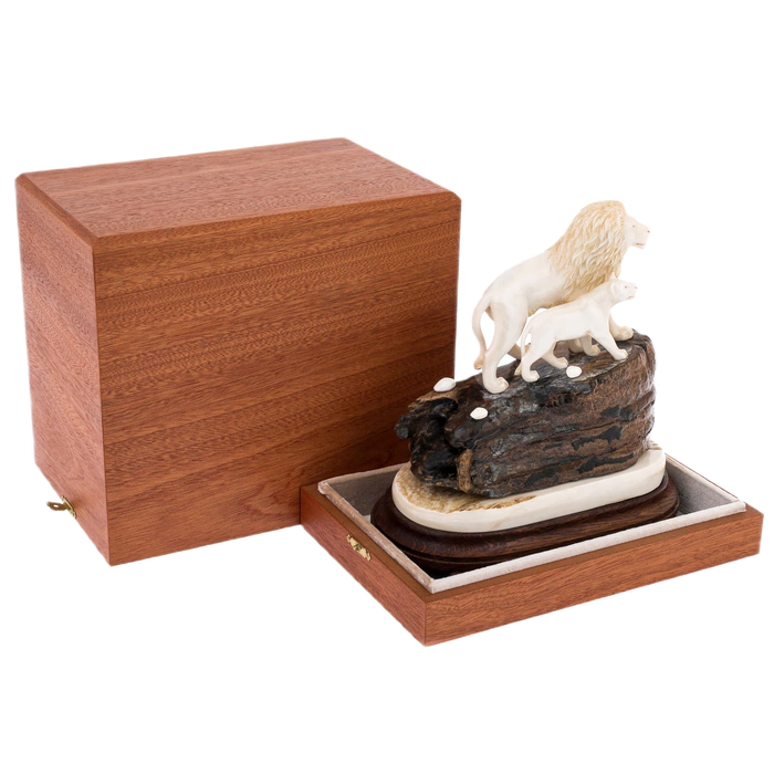 Sculpture of mammoth tooth, moose horn and mahogany "Lion and lioness on a rock"