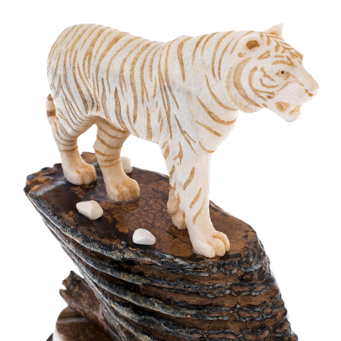 Sculpture of mammoth tooth, moose horn and mahogany Tiger