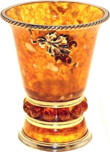 A glass of amber vodka "Grape"