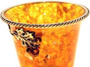 A glass of amber vodka "Grape"
