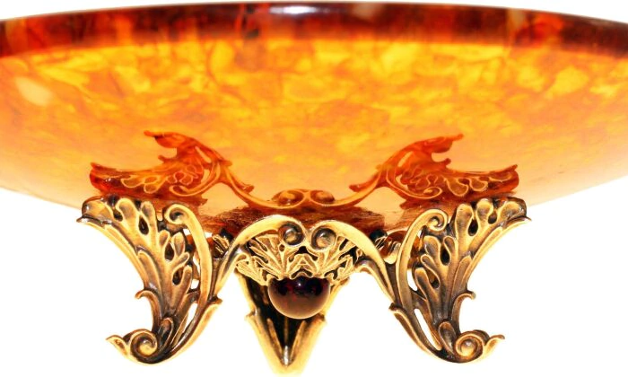 A candy bowl made of amber is low