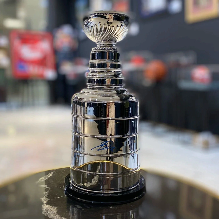 A replica of the Stanley Cup autographed by hockey player Alexander Barkov