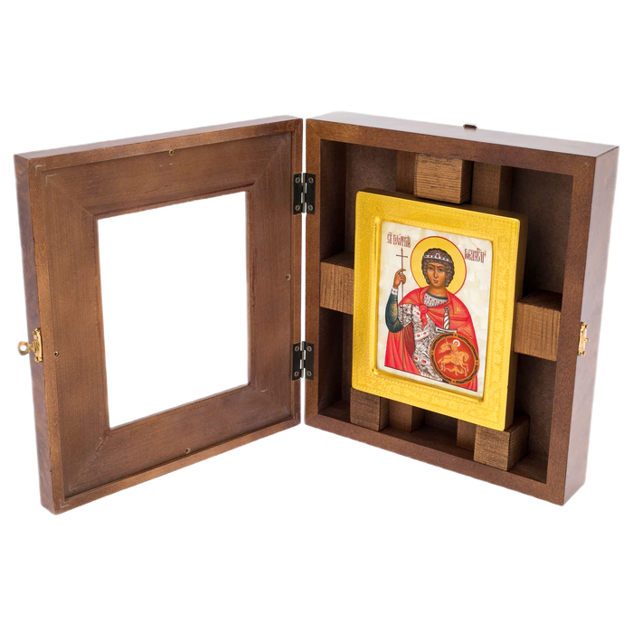 The icon on natural mother-of-pearl "George the Victorious" in a gold frame and a kiosk